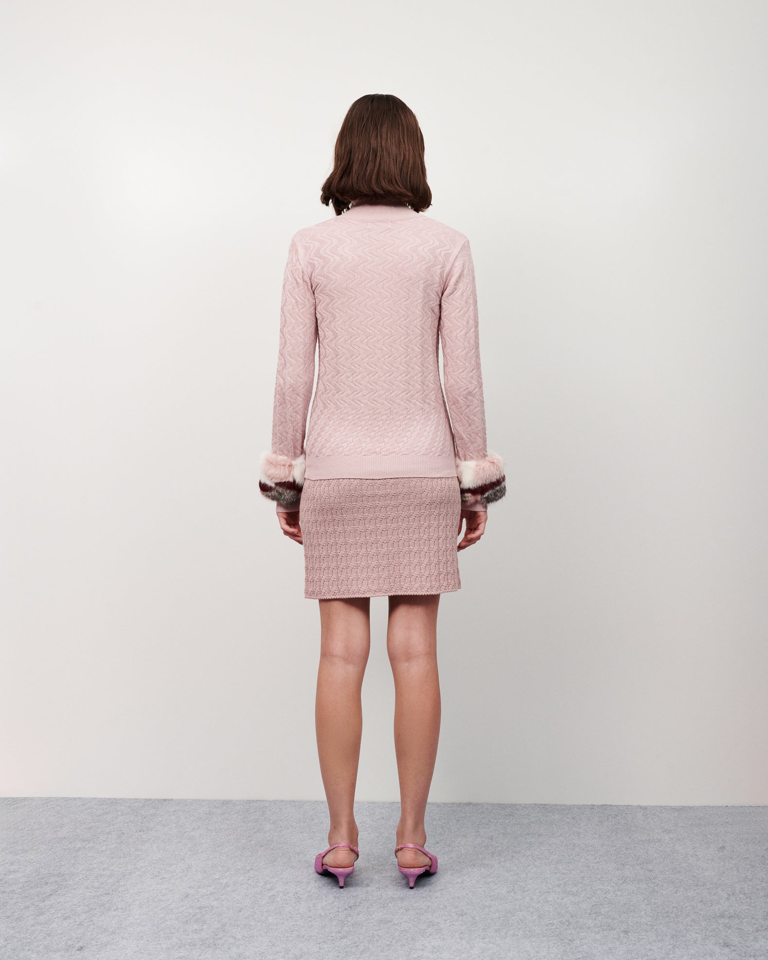 Blusa tricot gola roule botões punho pele